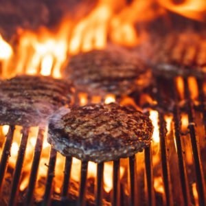 Burgers on a hot grill